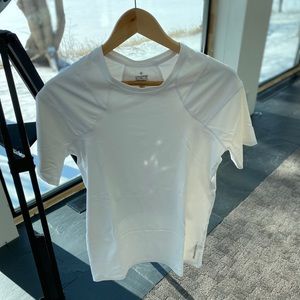 Three XL Men’s Tommie Copper support shirts